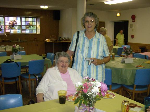 Angelica with Terry Young in the Sisters' dining room at Good Counsel